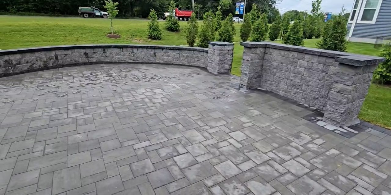 Elegant Paver Patio by All Pro Construction and Restoration